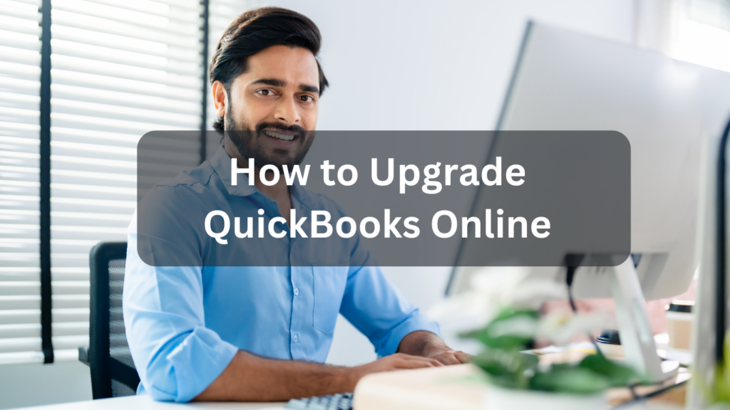 A person is working on computer to Upgrade QuickBooks Online